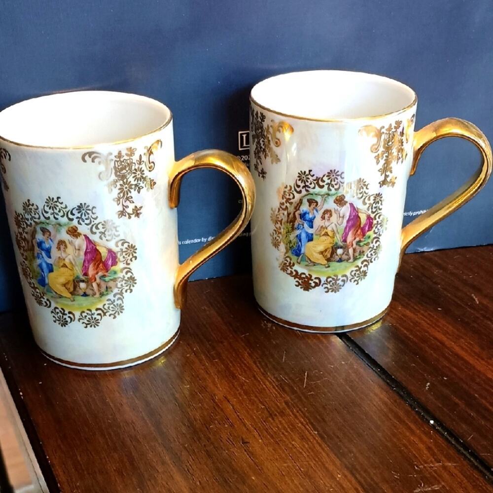 Elegant Gold and White Porcelain Mugs